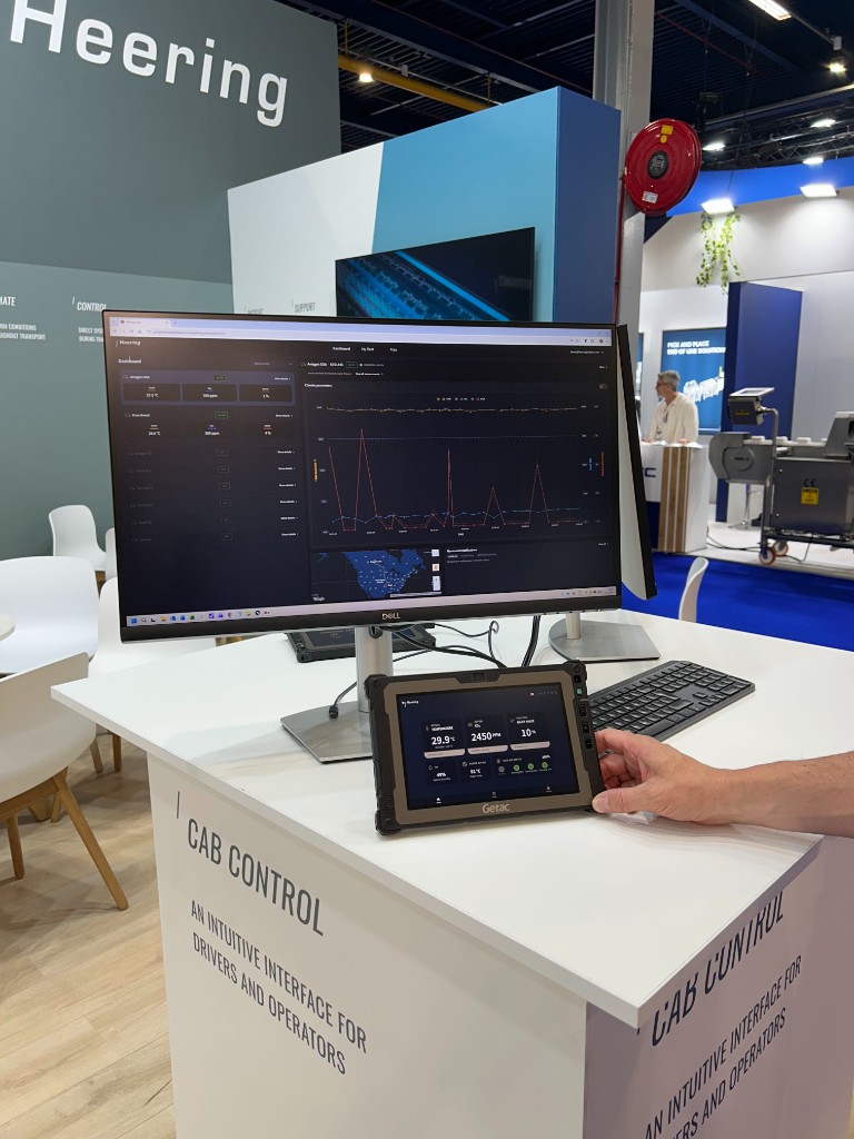 Desktop dashboard and Cab Control tablet at the Heering trade-show stand